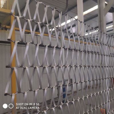 1.2 मिमी सर्पिल लिंक फ्लैट वायर मेष कन्वेयर बेल्ट क्लैडिंग बैलेंस वीव